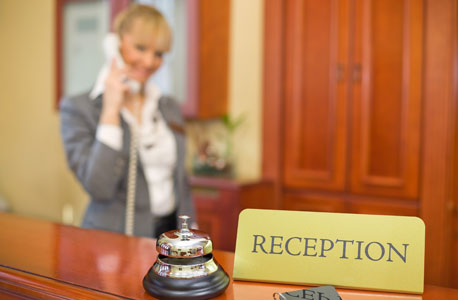 A hotel reception desk. Photo: Shutterstock