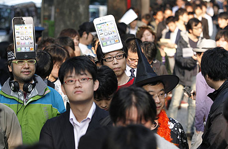 השוק היפני ממשיך לשמור אמונים לאייפון, צילום: בלומברג