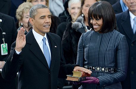 ברק ומישל אובמה בהשבעה. קריאה לאחדות