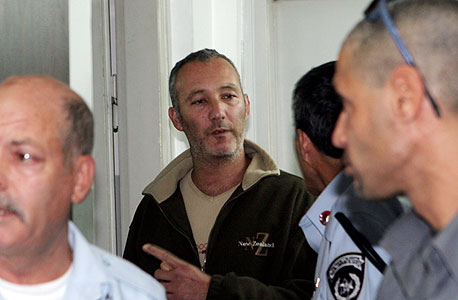 סביון משפטי בעת משפטו. "הבנק סיפק לו כסות חוקית ואמינות", טוענים התובעים סביון משפטי בעת משפטו. "הבנק סיפק לו כסות חוקית ואמינות", טוענים התובעים