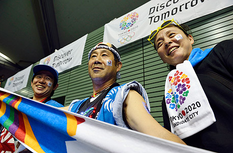 טוקיו יפן אזרחים שמחים לאחר בחירת העיר לאירוח אולימפיאדת 2020 אולימפיאדה, צילום: בלומברג