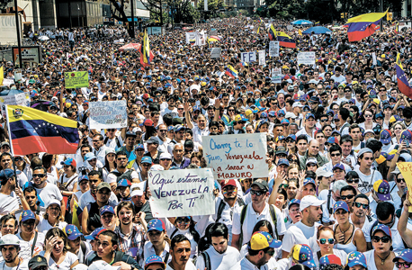 הפגנה בקראקס בירת ונצואלה. במקום הראשון בדירוג זו השנה השנייה, צילום: בלומברג
