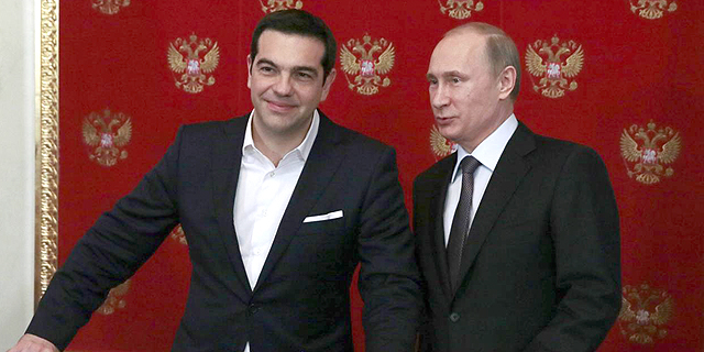 מימין: פוטין וציפרס. גם ברוסיה מודאגים מאפשרות יציאתה של יוון מגוש היורו, צילום: Metzel Mikhail