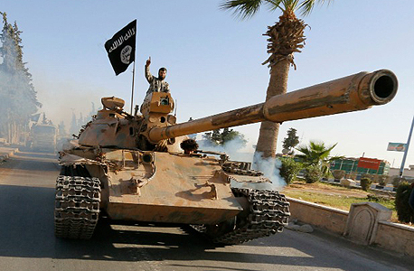 An ISIS militant. Photo: Reuters An ISIS militant. Photo: Reuters