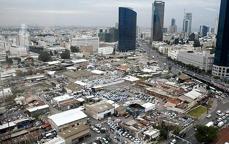 מגדלים במקום מוסכים. מתחם חסן ערפה בתל אביב, צילום: גלעד קוולרציק