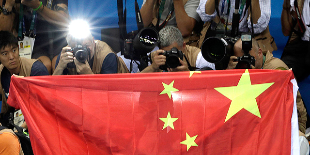 דגל סין. המארגנים בריו מיהרו להזמין דגלים חדשים , צילום: איי פי