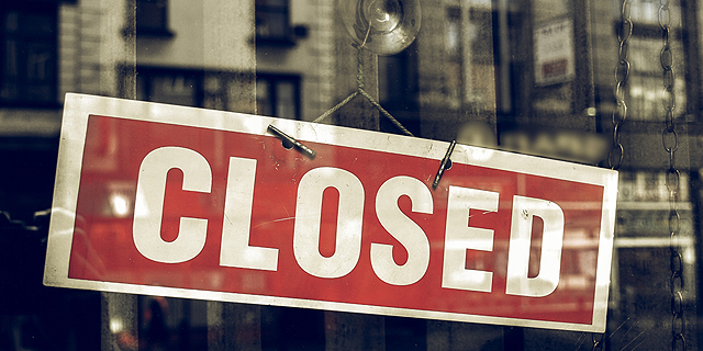 A closed for business sign. Photo: Shutterstock