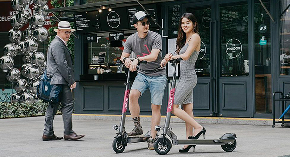 Electric scooters in Singapore. Photo: Popscoot