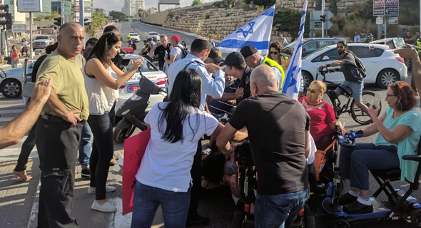 הפגנת הנכים במחלף הסירה, הרצליה הפגנת הנכים במחלף הסירה, הרצליה