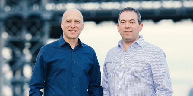 Outbrain co-CEOs David Kostman and Yaron Galai. Photo: Noam Galai