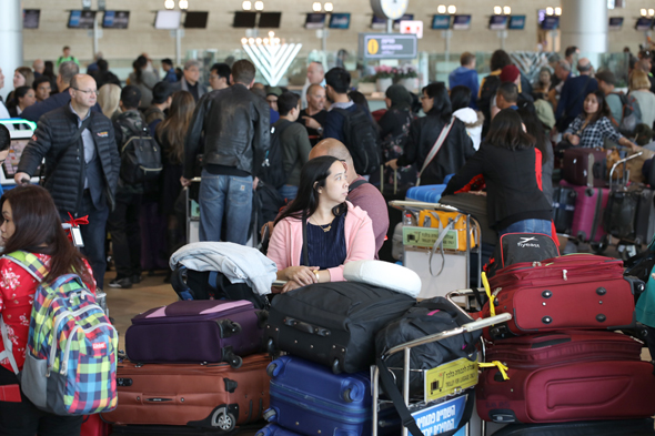 People waiting at Tel Aviv airport during the strike. Photo:  Aner Green