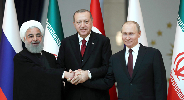 Iranian President Rouhani, Turkish President Erdoğan, and Russian President Putin. Photo: AFP Iranian President Rouhani, Turkish President Erdoğan, and Russian President Putin. Photo: AFP