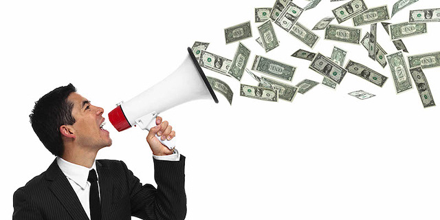 Money megaphone. Photo: Shutterstock