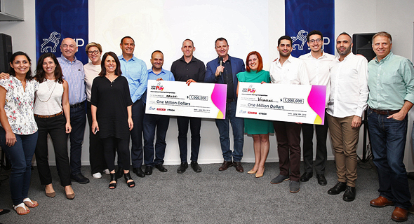 The winners receiving the award on Monday in Jerusalem. Photo: Orel Cohen The winners receiving the award on Monday in Jerusalem. Photo: Orel Cohen
