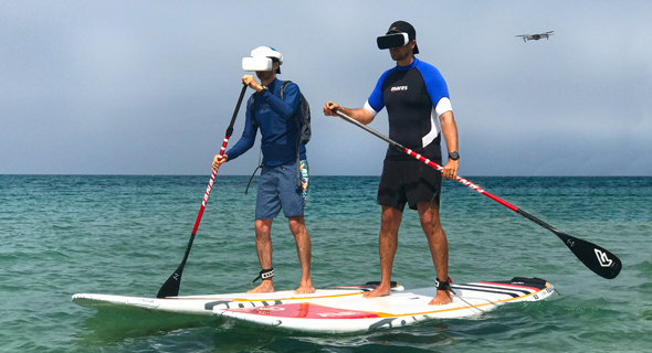 Paddle boarders with AR headsets. Photo: XTend Paddle boarders with AR headsets. Photo: XTend