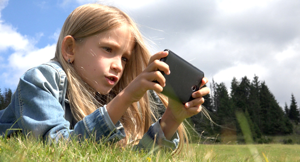 A child playing a video game. Photo: shutterstock A child playing a video game. Photo: shutterstock