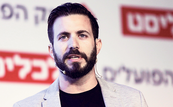 Guesty co-founder Amiad Soto. Photo: Amit Sha'al Guesty co-founder Amiad Soto. Photo: Amit Sha'al