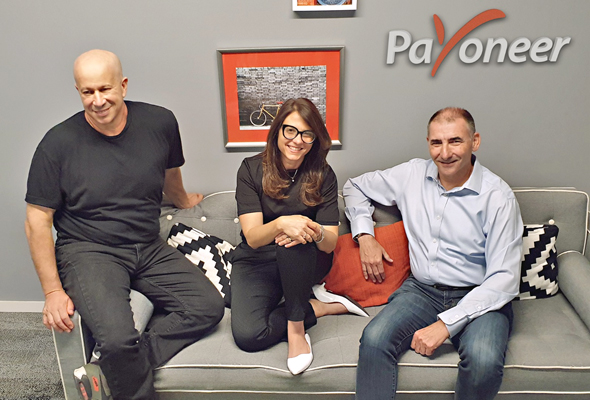 Payoneer's Yoel Naveh (right), Karen Levy, and Yuval Tal. Photo: Payoneer Payoneer's Yoel Naveh (right), Karen Levy, and Yuval Tal. Photo: Payoneer