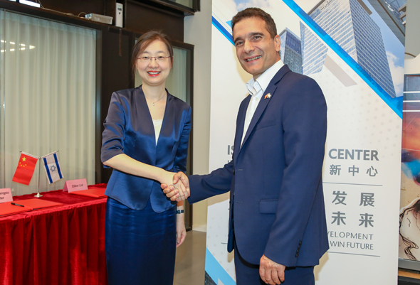 Photo: Li Lei, vice director of Wujin Hi-tech industrial zone, Changzhou (left) with Ilan Maimon, managing director of the center. Photo: Rami Levy Photo: Li Lei, vice director of Wujin Hi-tech industrial zone, Changzhou (left) with Ilan Maimon, managing director of the center. Photo: Rami Levy