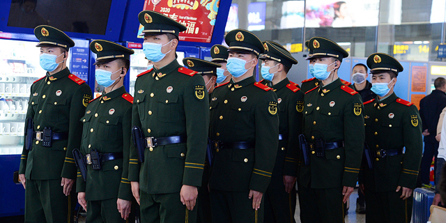 מתגוננים מפני הווירוס בסין, צילום: איי פי