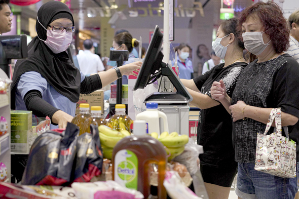 סופרמרקט בסינגפור בזמן הקורונה, צילום: גטי אימג