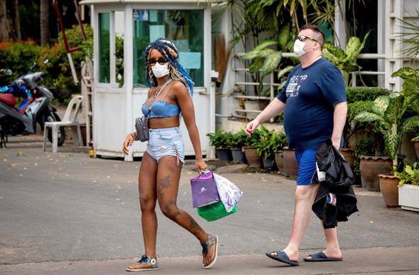 Tourists wearing masks in Thailand. Photo: AFP