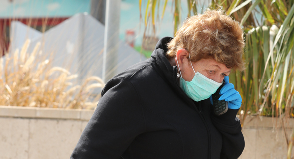 A woman wearing a mask (illustartion). Photo: Gadi Kabalo