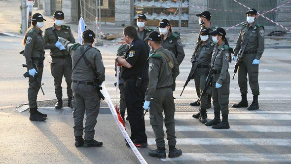 Police officers in Bnei Brak during the Covid-19 outbreak. Photo: Israel Police Spokesperson Police officers in Bnei Brak during the Covid-19 outbreak. Photo: Israel Police Spokesperson