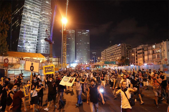 Protesters took to the streets in Tel Aviv on Saturday night. Photo: Tal Shachar Protesters took to the streets in Tel Aviv on Saturday night. Photo: Tal Shachar