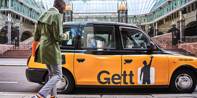 A man enters a Gett vehicle. Photo: Gett