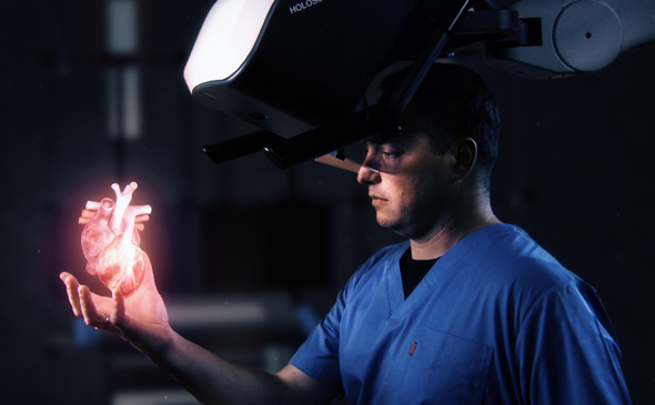 A person looking at a hologram of a human heart. Photo: RealView Imaging A person looking at a hologram of a human heart. Photo: RealView Imaging