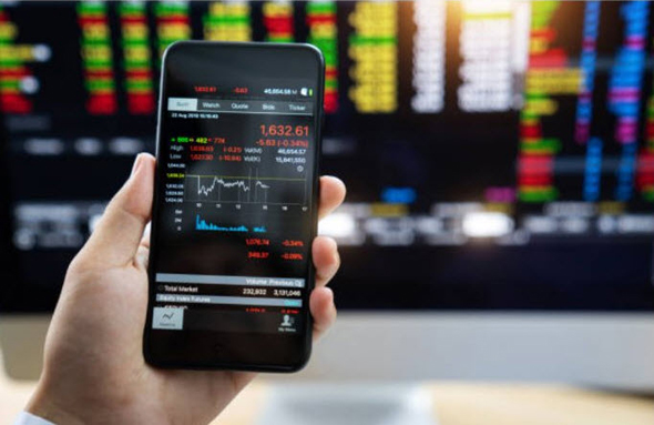 Day traders rely on apps to folow the market. Photo: Getty images