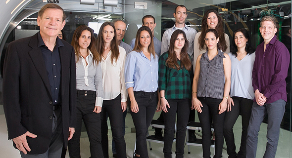 Infinidat founder Moshe Yanay (left) and company employees. Photo: Orel Cohen Infinidat founder Moshe Yanay (left) and company employees. Photo: Orel Cohen