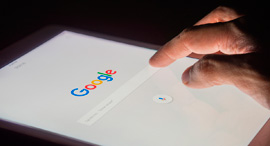 A person conducting a search on Google. Photo: Shutterstock