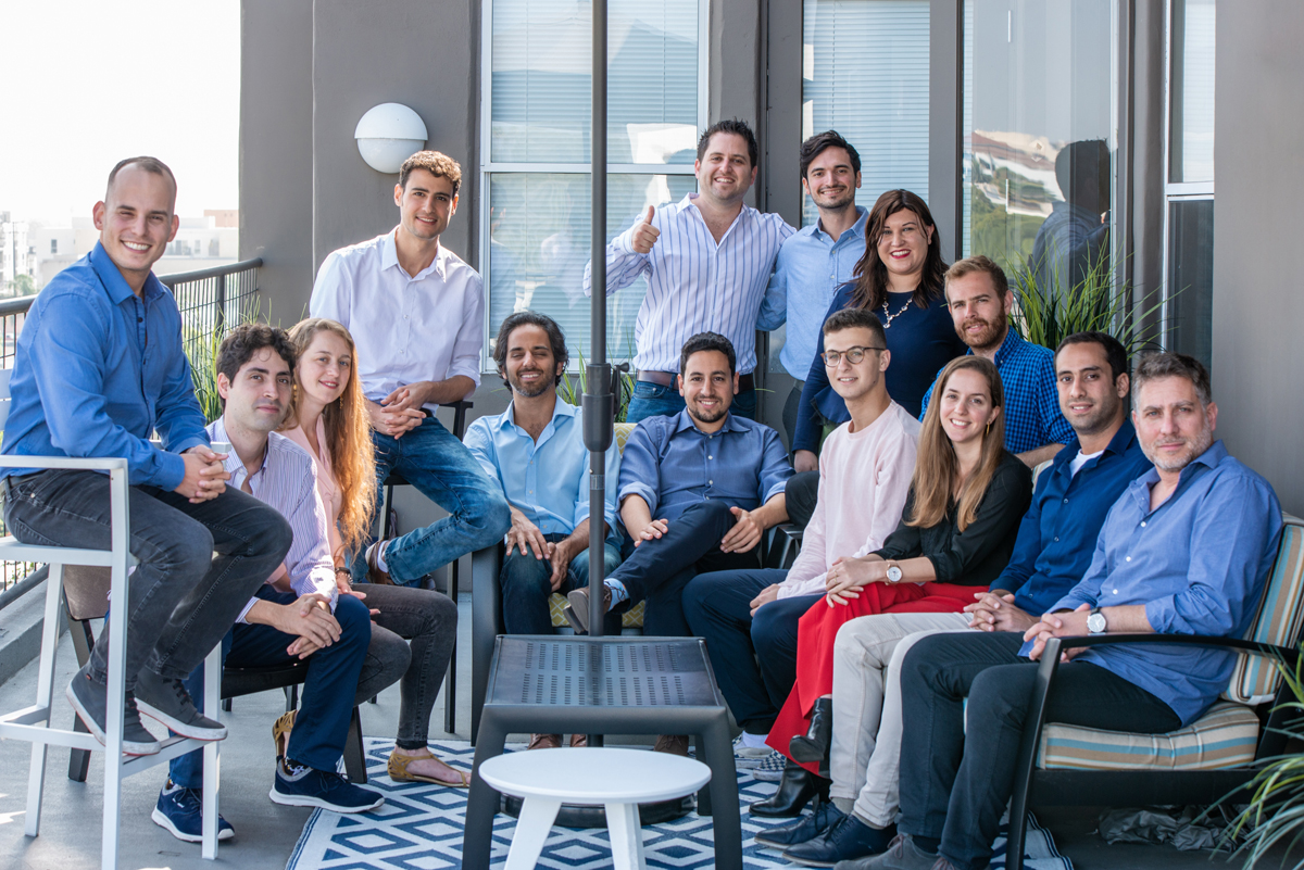 Fusion LA founders Guy Katsovich (left) and Yair Vardi (center) together with participants in their accelerator. Photo: Courtesy