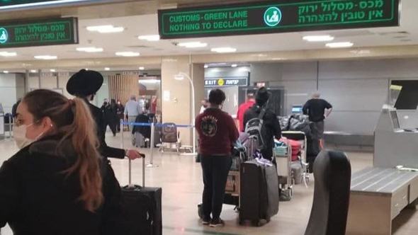 נוסעים ששבו מארה"ב בנתב"ג ולא מועברים לבידוד נוסעים ששבו מארה"ב בנתב"ג ולא מועברים לבידוד