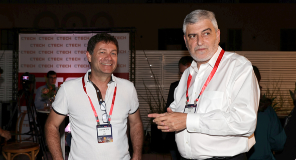 מימין דב קוטלר מנכ"ל הפועלים אריק שטיינברג יו"ר REE , צילום: אוראל כהן