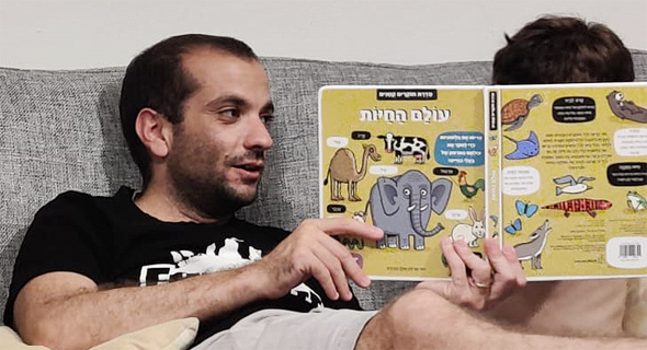 Itay Galea reading a bedtime story. Photo: Courtesy Itay Galea reading a bedtime story. Photo: Courtesy