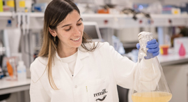 Maya Danino holds up the alternative "milk." Photo: Tal Zelicovitch