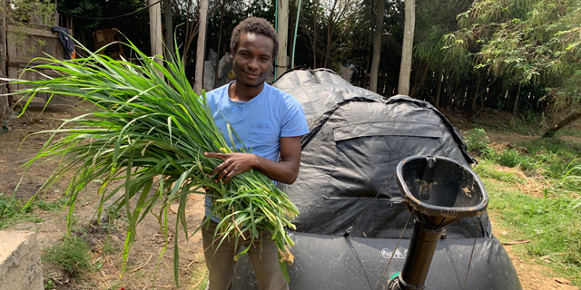A man uses the HomeBiogas system to generate clean energy to produce crops in Africa. Photo: HomeBiogas
