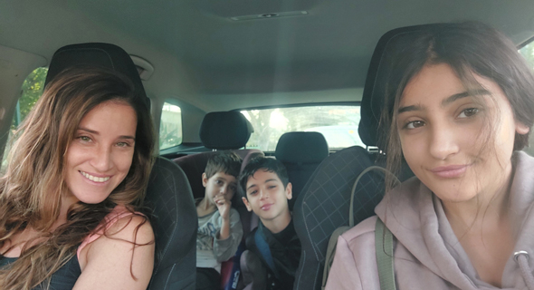 Noa Ohana Franko driving her kids to school. Photo: Courtesy