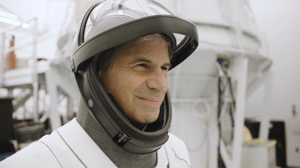 Eytan Stibbe dons his space suit at SpaceX's training facilities. Photo: Ori Burg/SpaceX