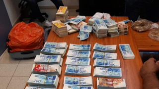 כסף שנמצא בכספת של איש העסקים הישראלי פטריק אלוני שנעצר בחשד שעקץ חברה אמריקאית