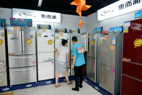 מקררים של חברת ווירפול האמריקאית בדליאן סין, צילום: איי אף פי