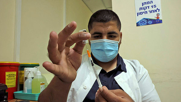 חיסון נגד קורונה, AFP