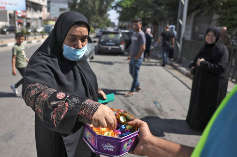 רצועת עזה. בין מערכה צבאית למערכה, חמאס מנסה להזרים כספים גם לשיפור רמת המחיה, צילום: AFP