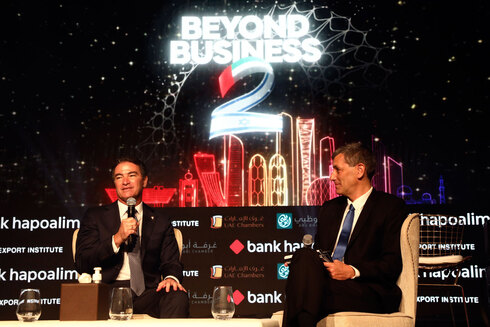 Yossi Cohen (left) at the Beyond Business 2 forum. Photo: Sivan Faraj