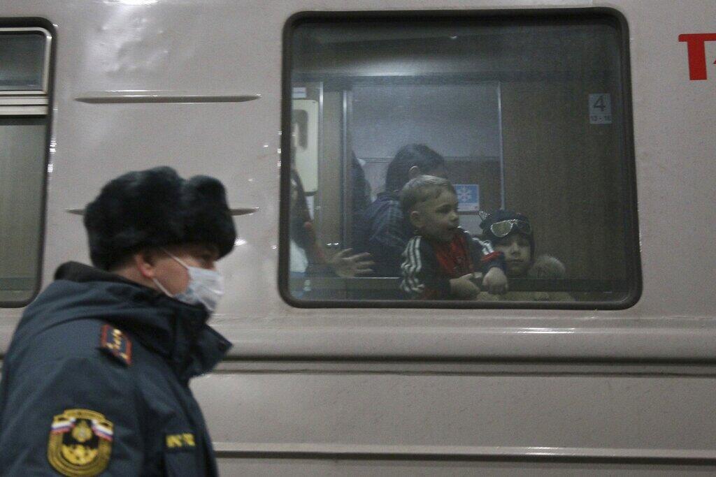 Ukraine Children evacuated by train from the Donetsk region against the background of the symbolism with Russia