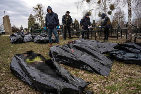 גופות באוקראינה. קריאה לאזרחים להתפנות ממזרח המדינה, ynet