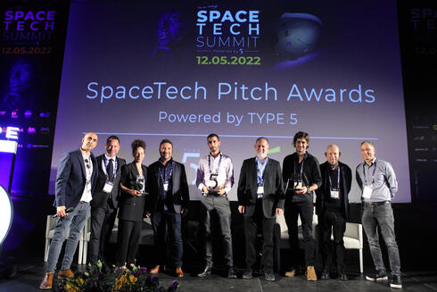 The TYPE5 co-founders on stage with Yuval Rakavy of BRM, Eli Barda and Erez Bader of E&Y, and the winners of the SpaceTech Pitch Awards. 